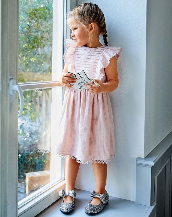 
En 8e place : la robe fillette à plastron  - Burda Style 10 meilleures ventes patrons PDF 2019